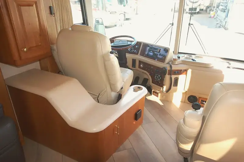 Motorhome cockpit with new cream leather seats